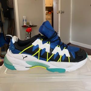 Puma, worn once size 8 in men’s, 10 in women’s.
